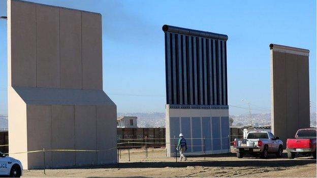 Three of U.S. President Donald Trump"s eight border wall prototypes are shown near completion along U.S.- Mexico border in San Diego