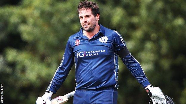 Scotland's Calum MacLeod celebrates his century against Afghanistan