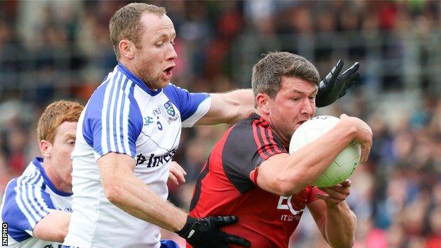 Monaghan's Vinny Corey and Kevin McKernan of Down in action during the Ulster semi-final