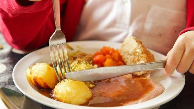 Child eating a school dinner