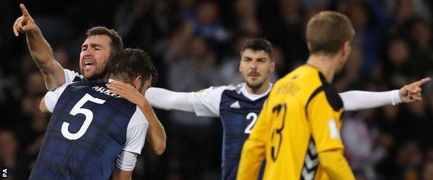 Scotland's James McArthur (left) celebrates his goal against Lithuania