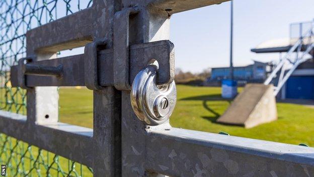 Padlocked gate