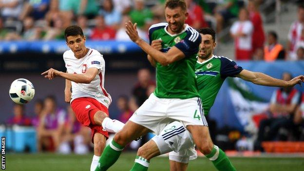 Bartosz Kapustka (left) in action for Poland against Northern Ireland at Euro 2016