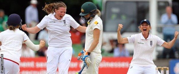 England celebrate taking an Australian wicket