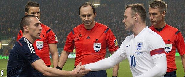 Scott Brown (left) and Wayne Rooney