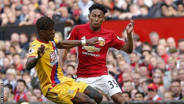 Demetri Mitchell playing for Manchester United