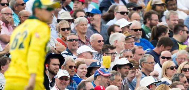 Some spectators goaded Australia's cricketers by waving sandpaper cards