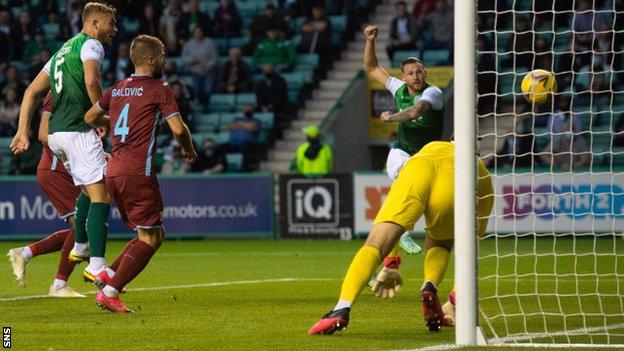 Martin Boyle (right) fires Hibs level against Rijeka