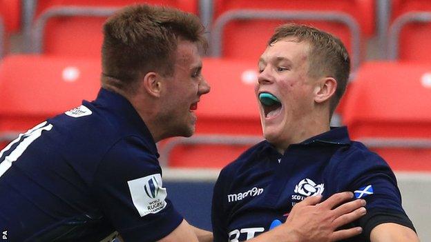 Darcy Graham (right) celebrates his winning try against Australia