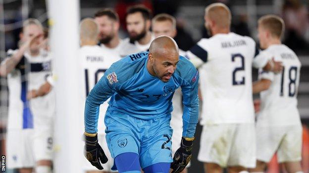 Darren Randolph shows his disappointment after his mistake led to Finland's goal