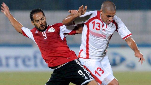 Egyptian forward Walid Sliman in action against Tunisia