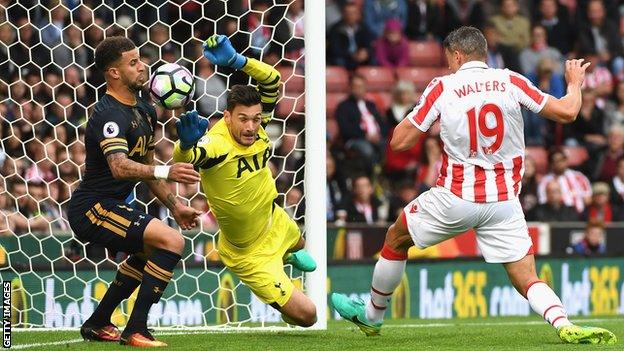 Kyle Walker (right) clears a Jonathan Walters effort off the goal-line against Stoke City