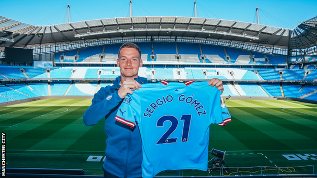 Sergio Gomez poses at the Etihad Stadium