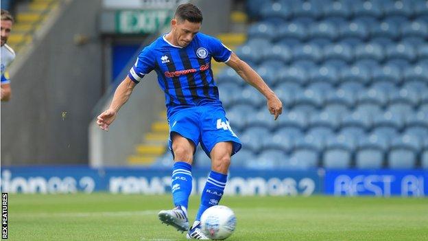 Ian Henderson scores a penalty