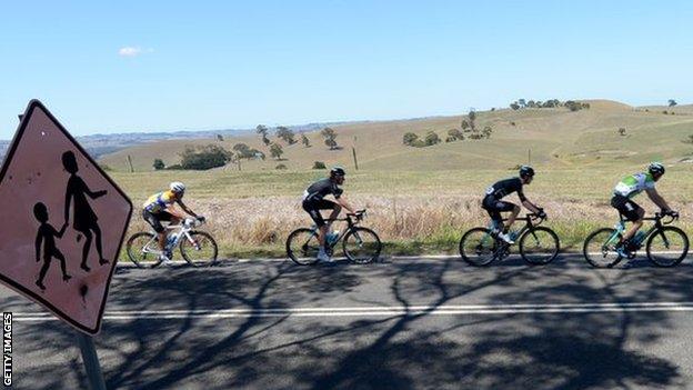 Chris Froome (right) leads team-mate Peter Kennaugh (left) through rural Victoria during stage three of the Herald Sun Tour.