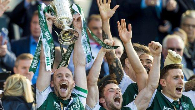 Hibernian captain David Gray lifts the Scottish Cup after beating Rangers last season