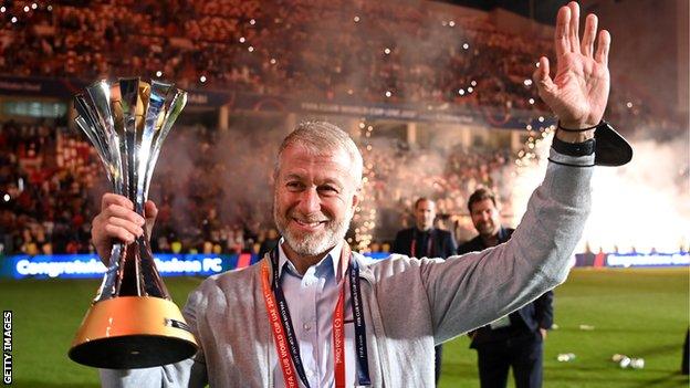 Roman Abaramovich with Club World Cup trophy