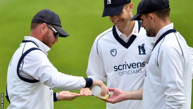 Ian Bell dispensing hand sanitiser