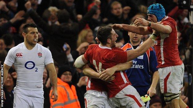 Wales celebrate one of their two tries against England in the 2013 Six Nations title decider in Cardiff