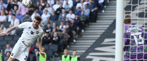 Troy Parrott scores for MK Dons