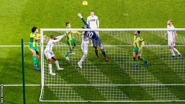 Ahmed Hegazi arrives at the Swansea far post before heading West Brom's winner