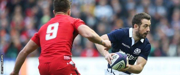 Greig Laidlaw takes on Rhys Webb