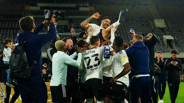 Fulham celebrate their promotion to the Premier League