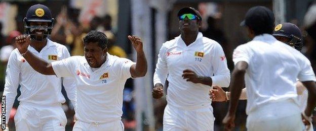 Sri Lanka's Rangana Herath (second left) celebrates a wicket