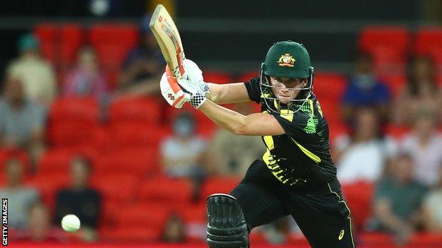 Australia batter Beth Mooney plays a shot in a T20 against India