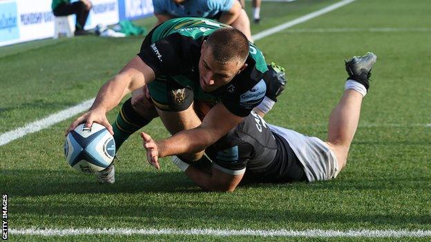 Northampton's Ollie Sleightholme scoring his second try against Newcastle