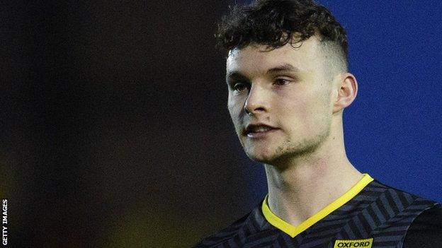 Championship side Burnley have signed defender Luke McNally from Oxford United on a four-year deal.