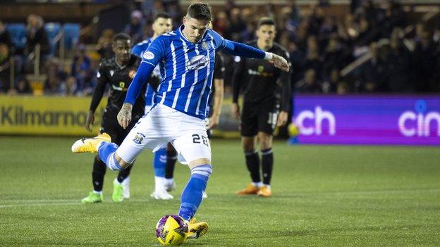 Kyle Lafferty slots home the game's opener from the spot