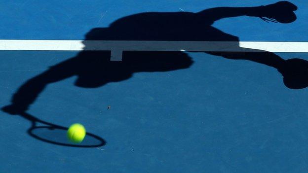 Silhouette of a tennis player