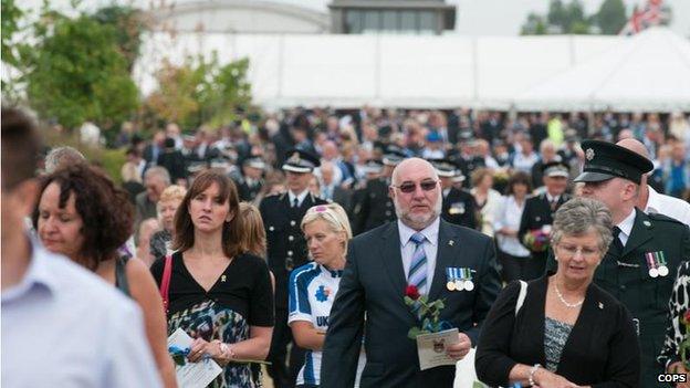 People at the arboretum service