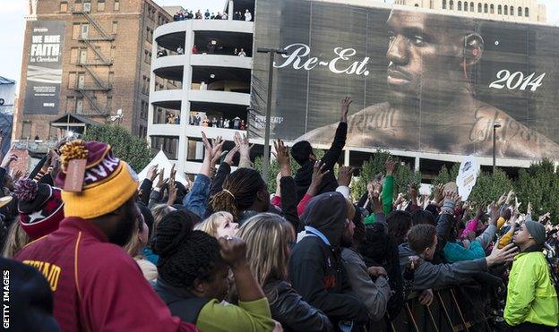 Cleveland fans pictured queuing on James' return to the Cavaliers