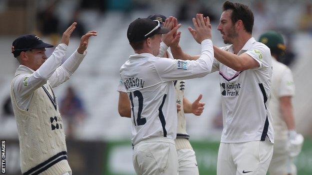 Middlesex celebrate a wicket