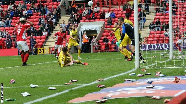 Crisps stop play at Charlton v Fleetwood