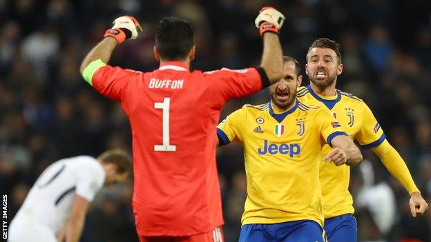 Juventus players celebrate after beating Tottenham