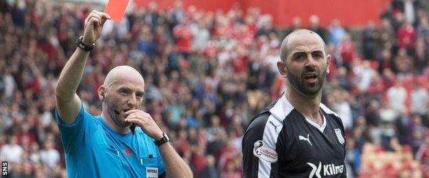 Dundee's Gary Harkins was sent off late on for fouling Adam Rooney in the box