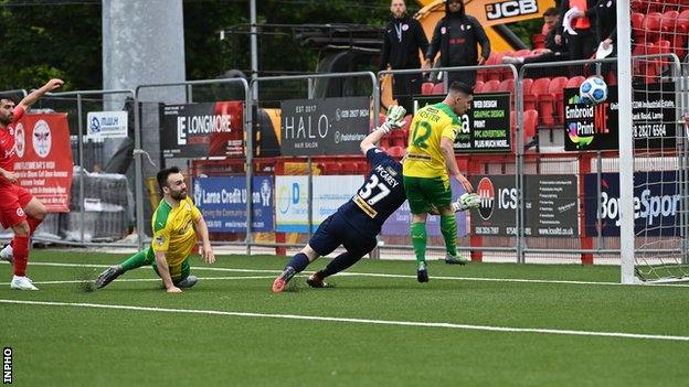 David McDaid scores Larne's opener against Cliftonville on Saturday evening