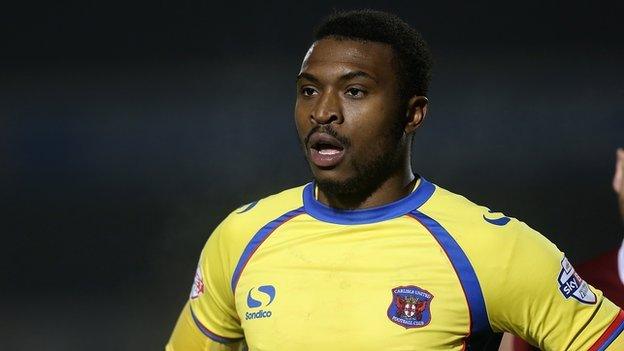 David Amoo in action for Carlisle United