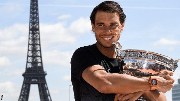 Rafael Nadal celebrates winning his 10th French Open title