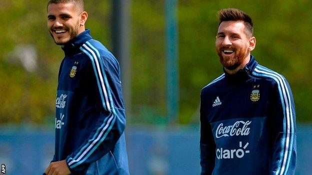 Mauro Icardi and Lionel Messi sharing a joke during a training session on Sunday