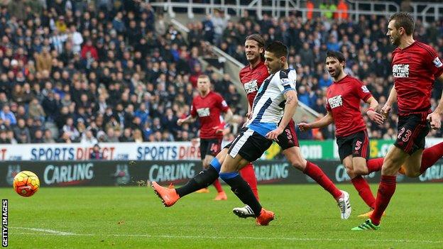 Newcastle's Aleksandar Mitrovic scores