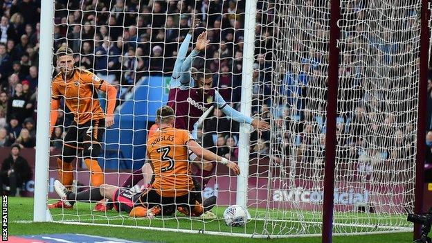 Albert Adomah scores Aston Villa's opening goal against Wolves