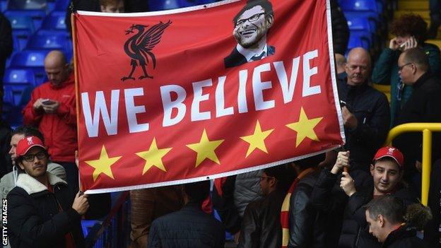 Liverpool fans with a Jurgen Klopp banner at White Hart Lane