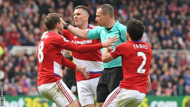 Middlesbrough players and Kevin Friend