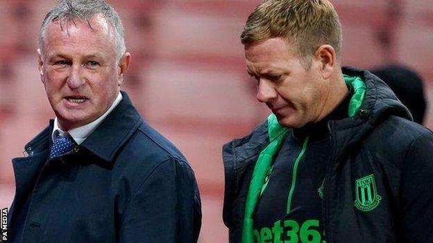 Michael O'Neill brought in former Bristol City boss Dean Holden as his number two in April