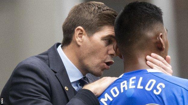 Steven Gerrard talks to Alfredo Morelos