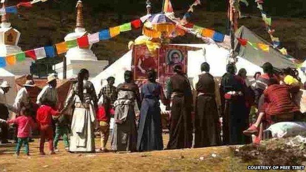 File photo provided courtesy of Free Tibet reportedly shows Tibetans holding a prayer service for Tenzin Delek Rinpoche, 12 October 2014